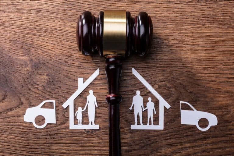 Concept: A Judge's Gavel Dividing A Household