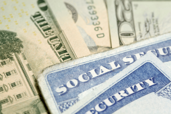 photo of $20 bills and social security cards