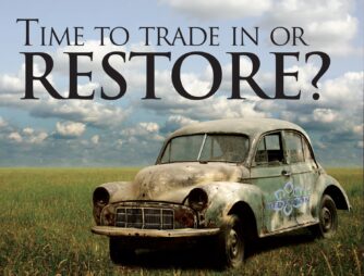 Old Car in Field with text 'Time to Trade In or Restore?'